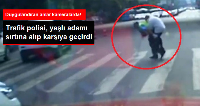 Trafik Polisi, Karşıdan Karşıya Geçmekte Zorlanan Yaşlı Adamı Sırtına Aldı