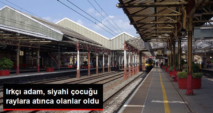 Irkçı Adamın Siyahi Çocuğu Tren Raylarına Attığı Anlar Kamerayla Kaydedildi